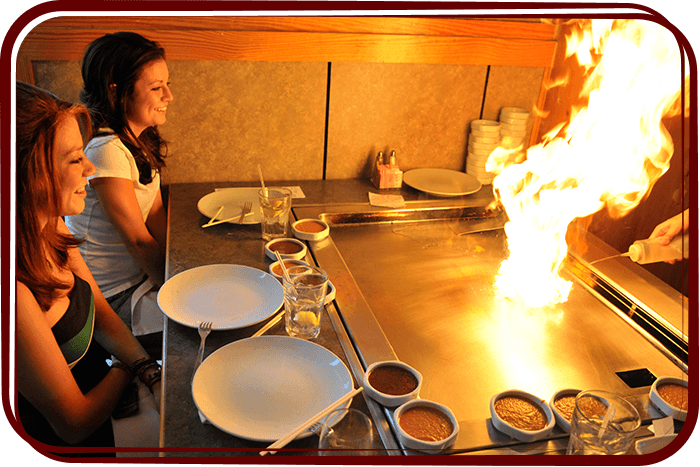 women at teppanyaki grill